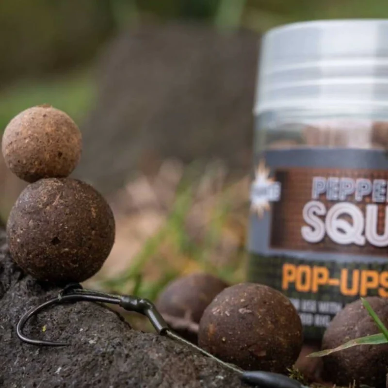 Плуващо топче DYNAMITE BAITS Peppered Squid Foodbait Pop-ups 15mm