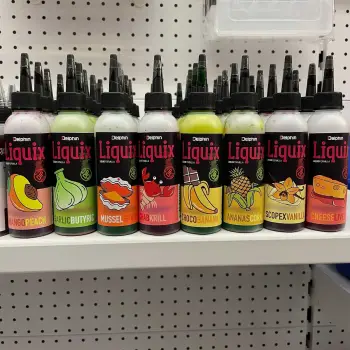 DELPHIN Fluo Smoke Dip D SNAX LiquiX Garlic Butyric 100 ml